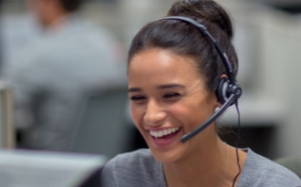 Female employee talking on headset
