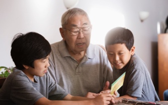 Two pre-teen boys with grandfather