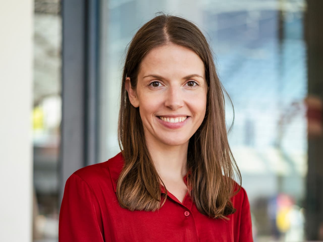 A smiling woman professional