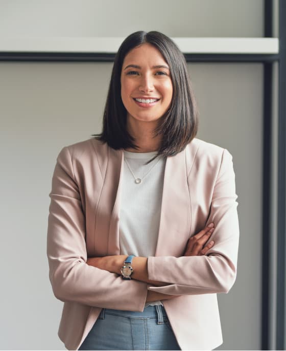 Woman in pink blazer