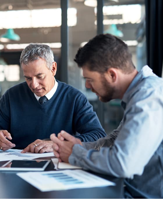 Two men working at a table