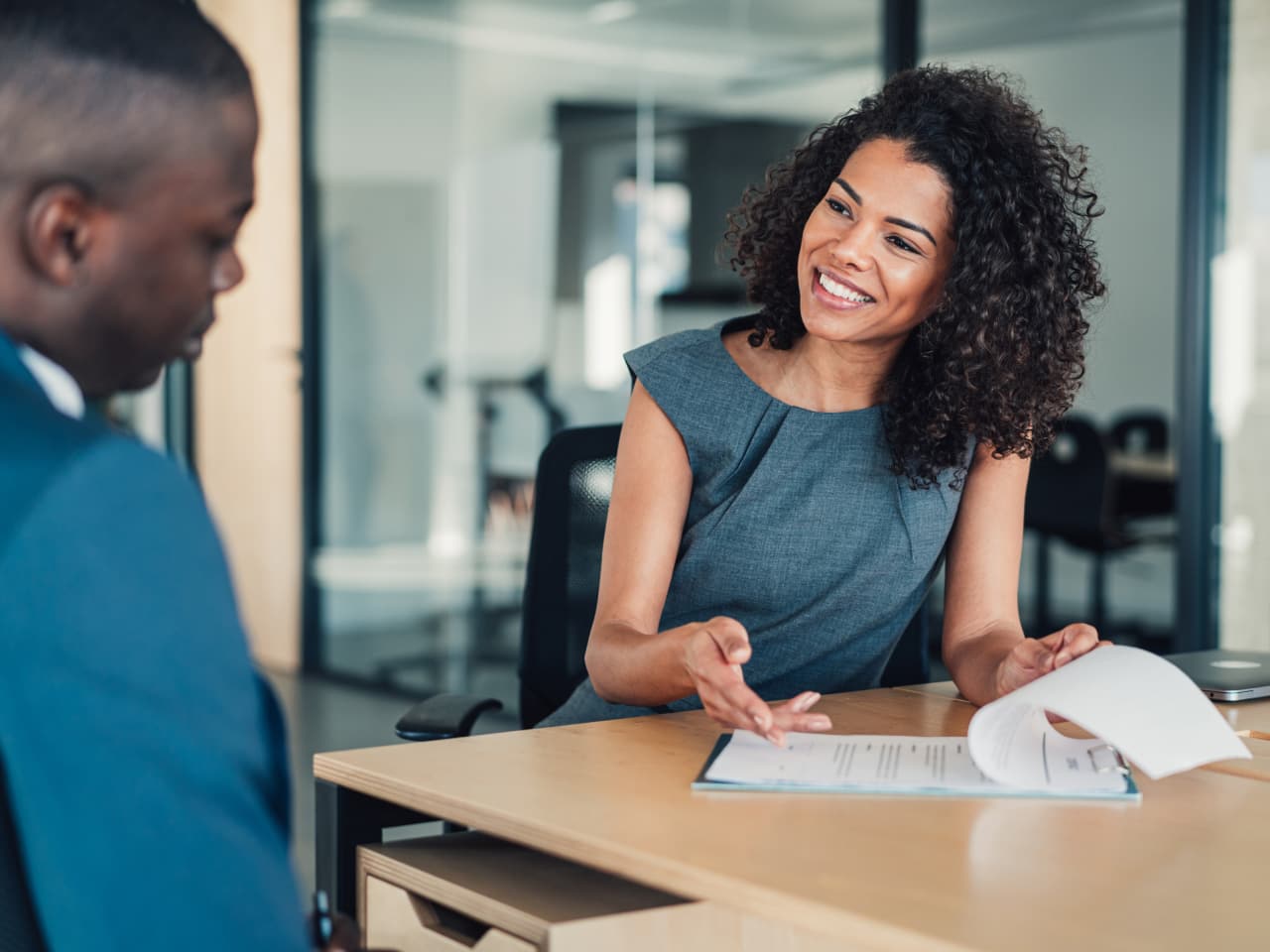 A man and woman in a meeting