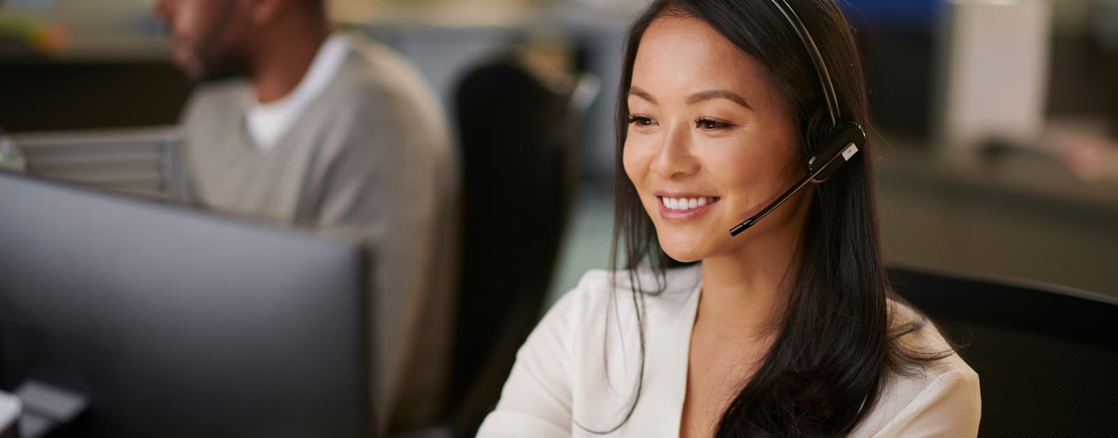 A call operator smiling