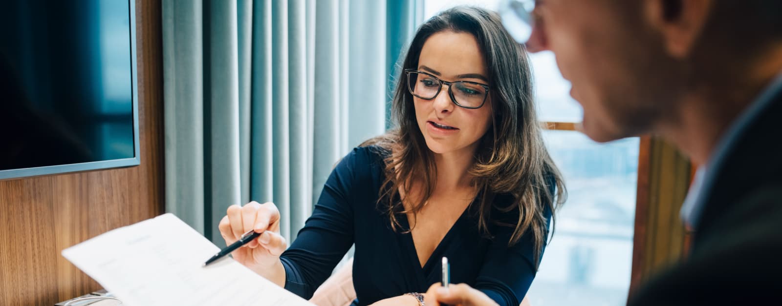 A woman collaborating with a colleague